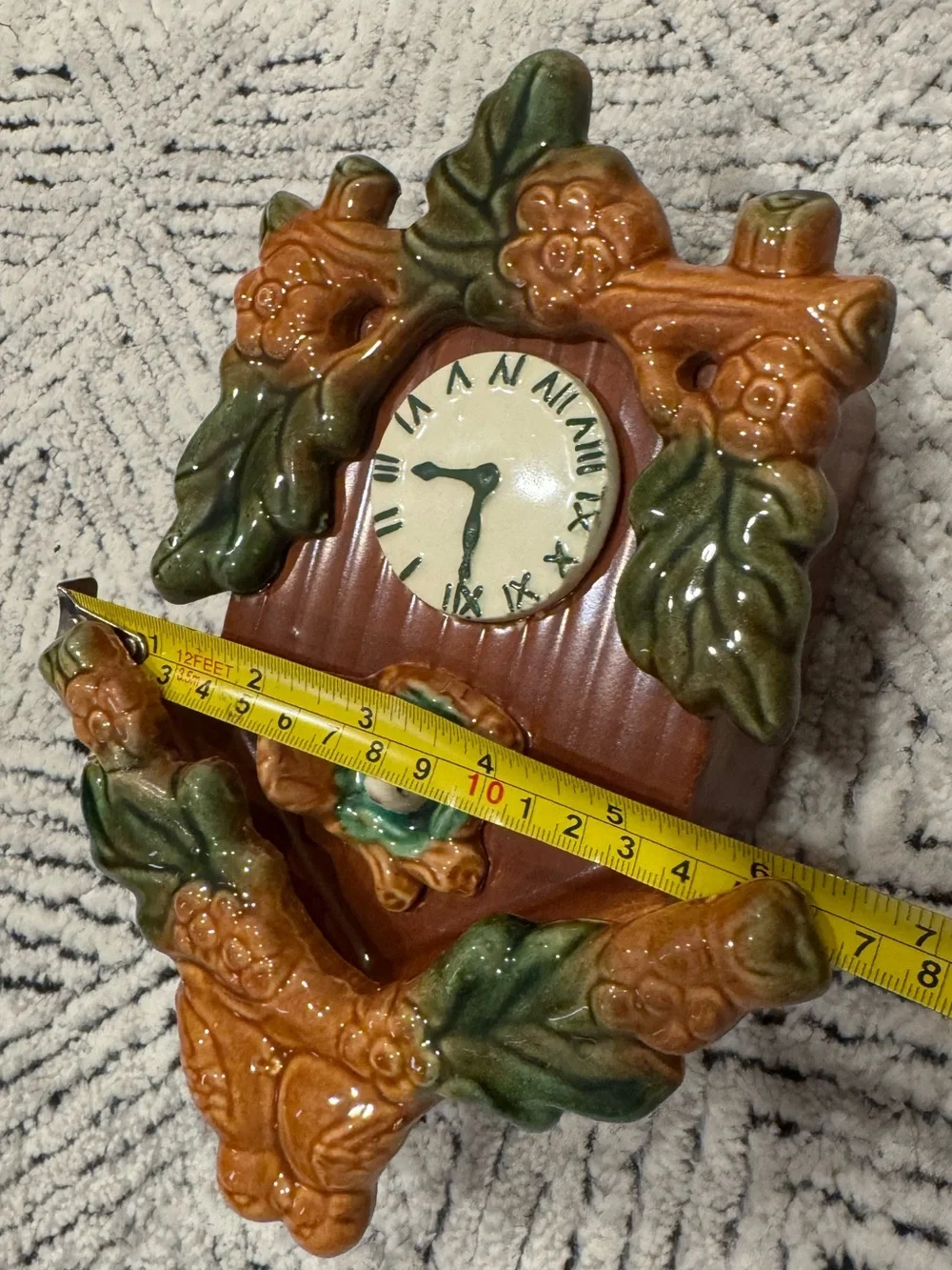 Ceramic Cuckoo Clock Wall Accent in Brown and Green